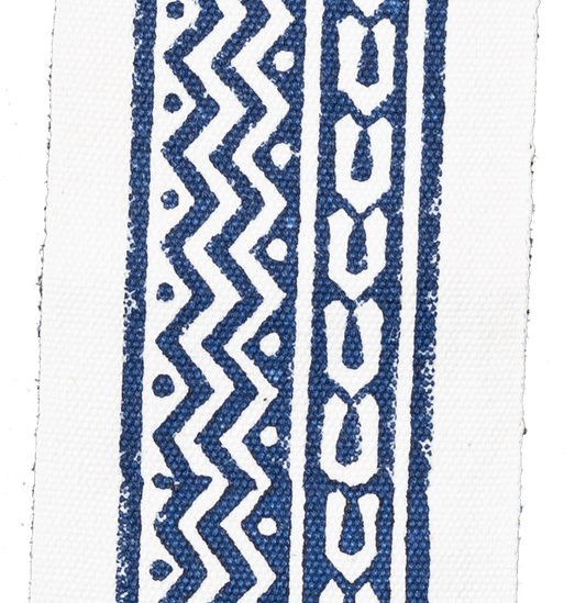 Blue and white geometric fabric swatch from Coley Home.com, featuring bold zig-zag and stripe patterns.
