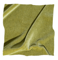 Olive green fabric swatch from Coley Home, showcasing texture and color for upholstery and design.