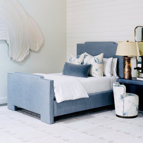 Blue Upholstered Bed in white bedroom