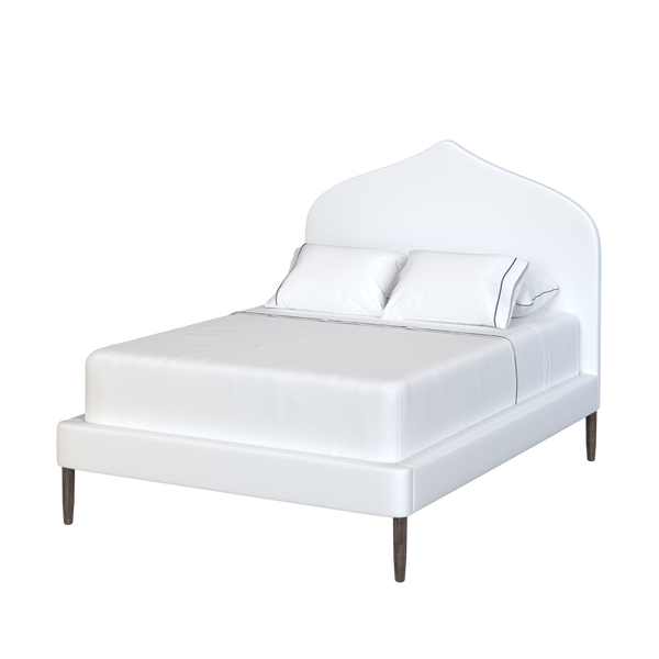 Coley Home custom upholstered bed with scalloped headboard in a white fabric.