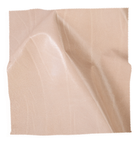 Beige fabric swatch from Coley Home showcasing texture and color.