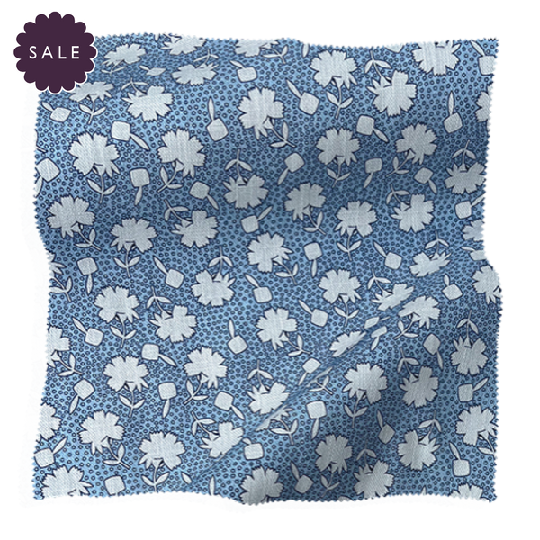 Blue floral fabric swatch from Coley Home, ideal for custom upholstery projects.