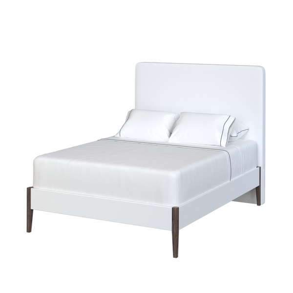 Coley Home white bed with headboard and wooden legs. Modern bedroom furniture design.