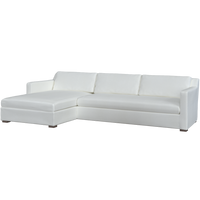 White sectional sofa by Coley Home with chaise lounge, elegant and modern design.