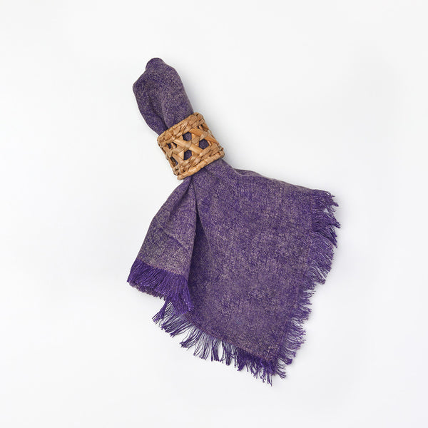 Purple fringed napkin with decorative ring from Coley Home.